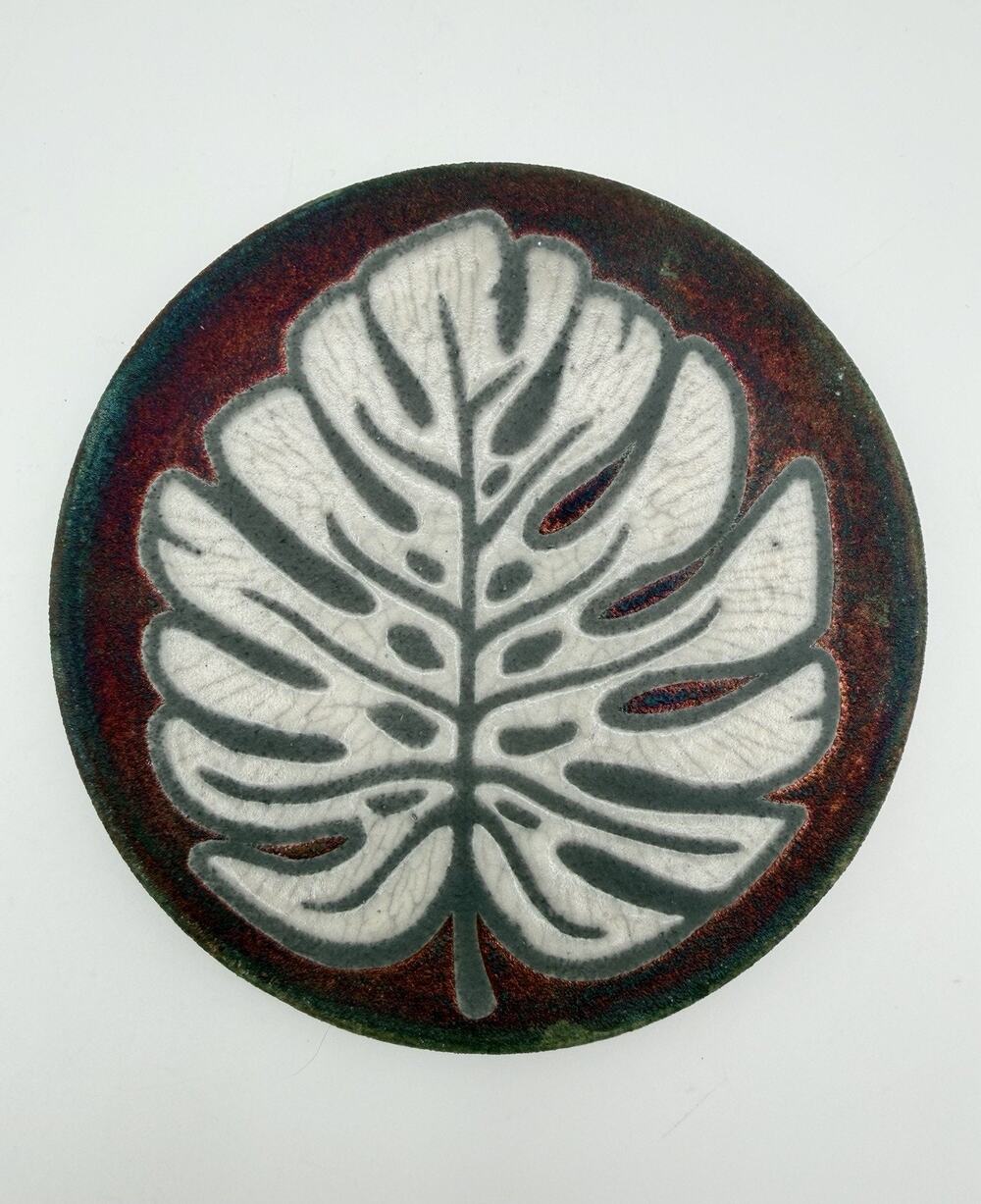Jeremy Diller Raku Pottery Coaster 4.25” with White Monstera Leaf Signed